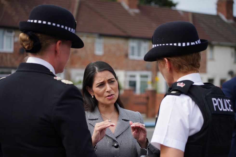 Home Secretary Priti Patel visits the scene in Kingsheath Avenue, Knotty Ash, Liverpool, where nine-year-old Olivia Pratt-Korbel was fatally shot on Monday night. Picture date: Friday August 26, 2022.