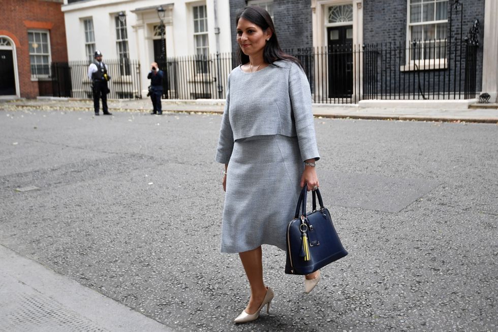 Home Secretary Priti Patel walks outside Downing Street