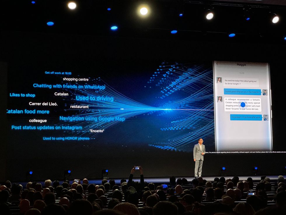 honor ceo george zhao on stage showing how the LLM works in the magic 6 pro
