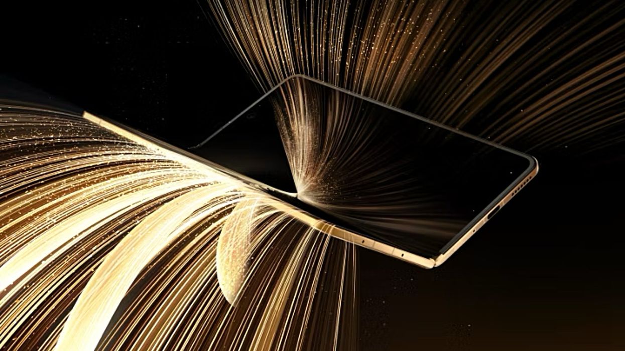 honor magic v5 pictured with gold particles shooting out from the folding hinge