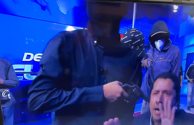Horror moment armed gunmen storm Ecuador TV station and hold staff at  gunpoint