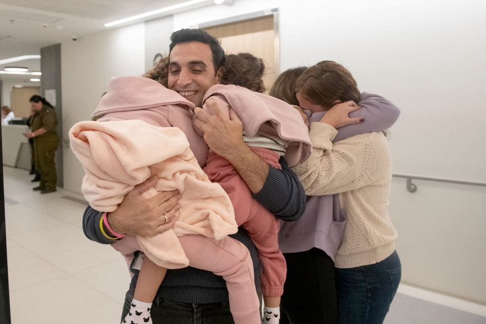 Hostages reunited with family