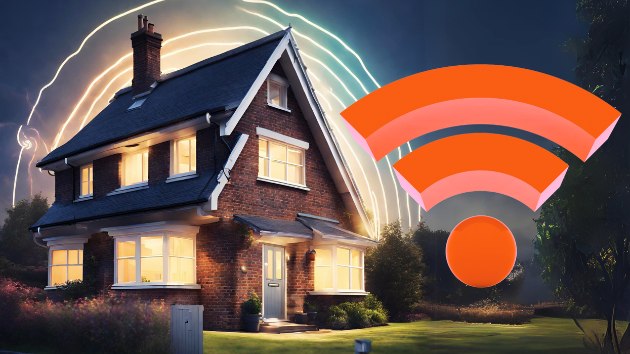house with wi-fi signal surrounding it with the universal symbol for broadband superimposed