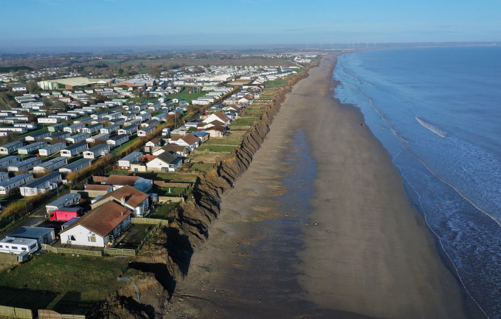 Houses on the coastline in Skipsea, East Ridings of Yorkshire, where councillors are set to discuss the %22devastating%22 effect of erosion that will see dozens of people in Skipsea lose their homes to the sea on the fastest disappearing coastline in North West Europe.