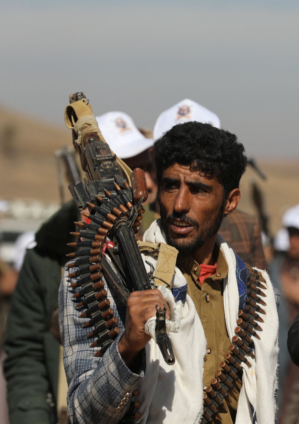 Houthi fighter carrying gun