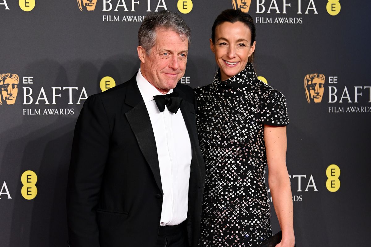 Hugh Grant and Anna Eberstein