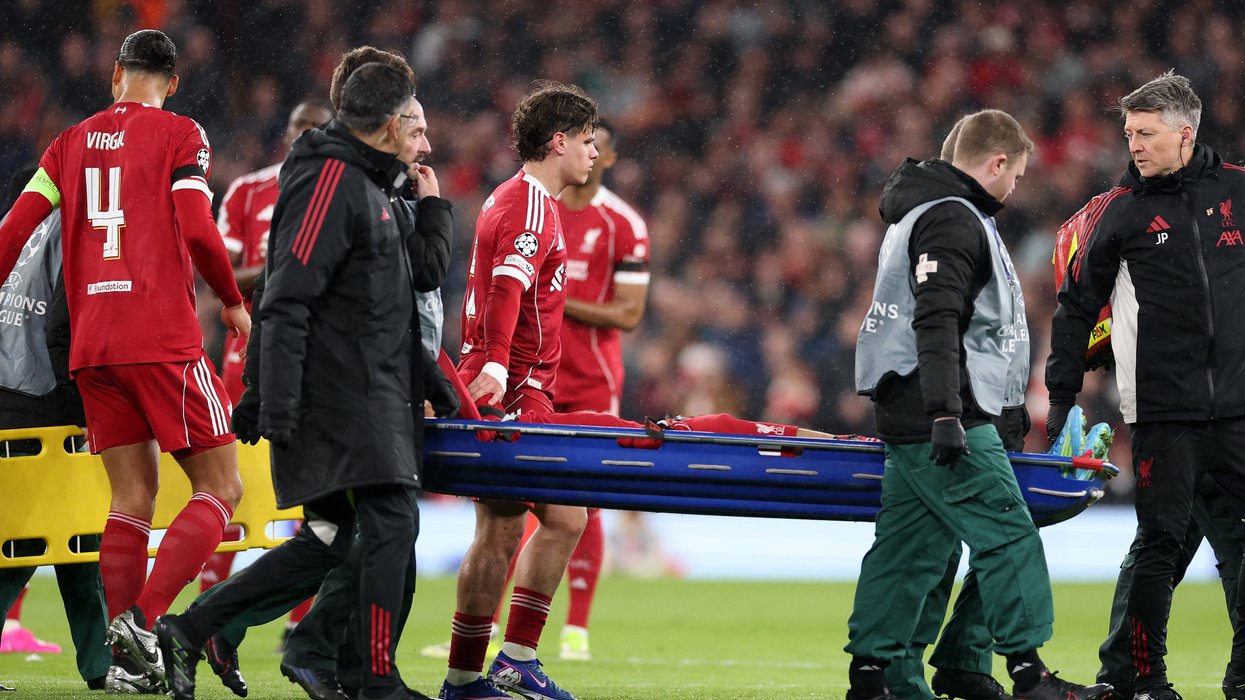 Liverpool star stretchered off after concerning injury as PSG Champions League clash delayed