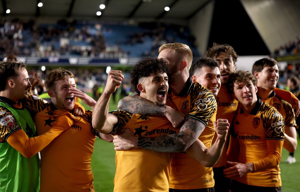 Hull defeated Millwall 2-0 to put themselves within one match of promotion to the Premier League