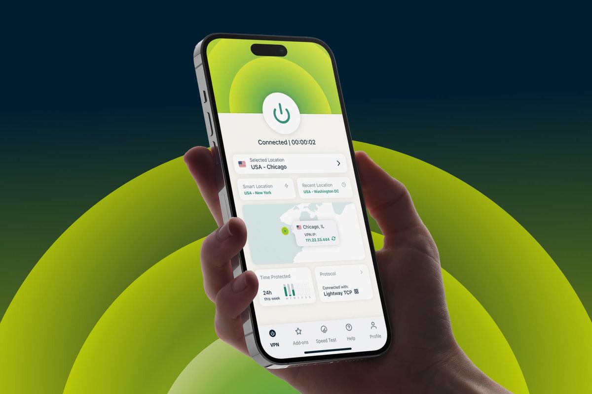 human hand pictured holding an iphone with the ExpressVPN app running on-screen