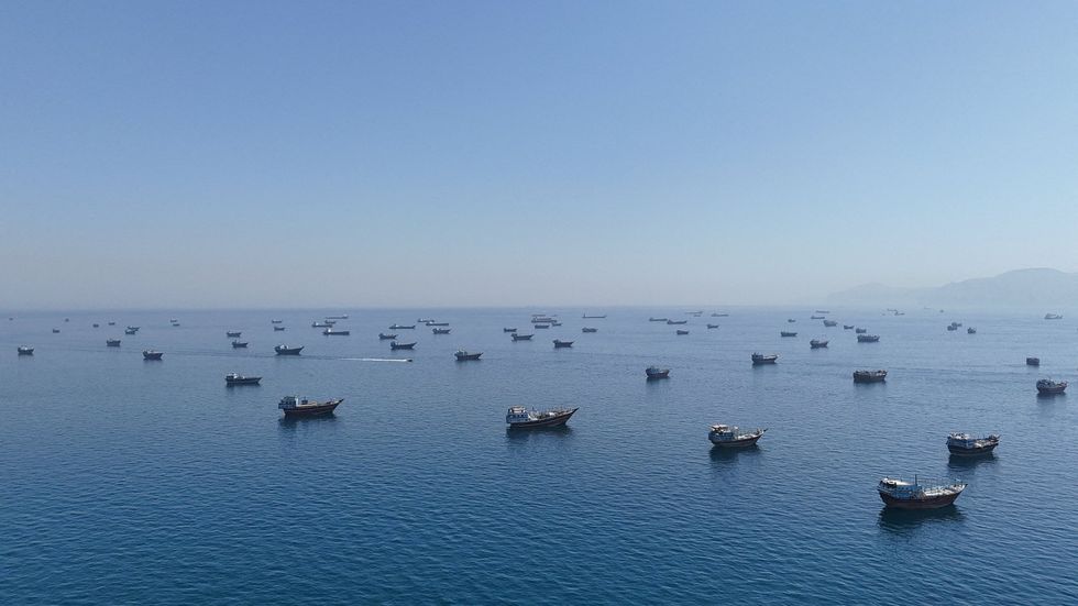 Hundreds of ships are waiting to make the Strait of Hormuz crossing