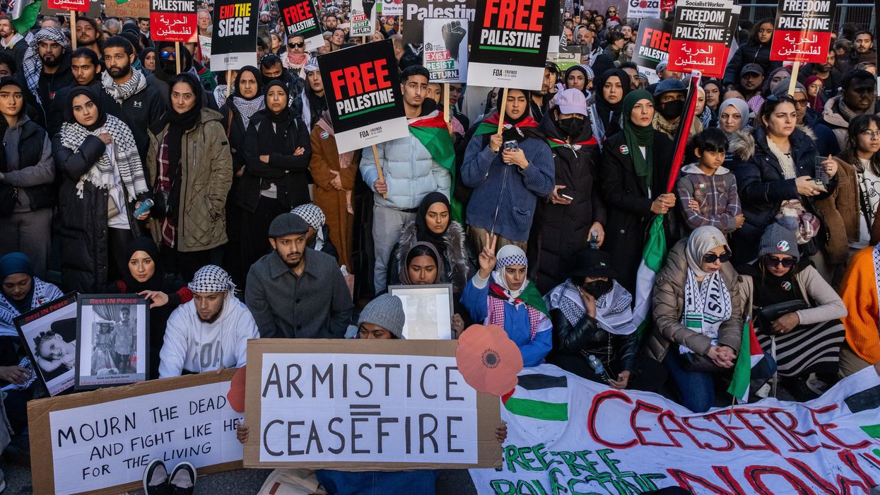 Hundreds of thousands of pro-Palestinian protesters attend an Armistice Day rally