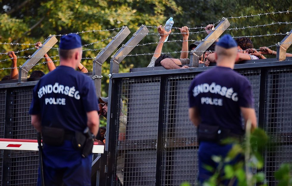 Hungarian police officers at the Hungarian-Serbian border back in 2015