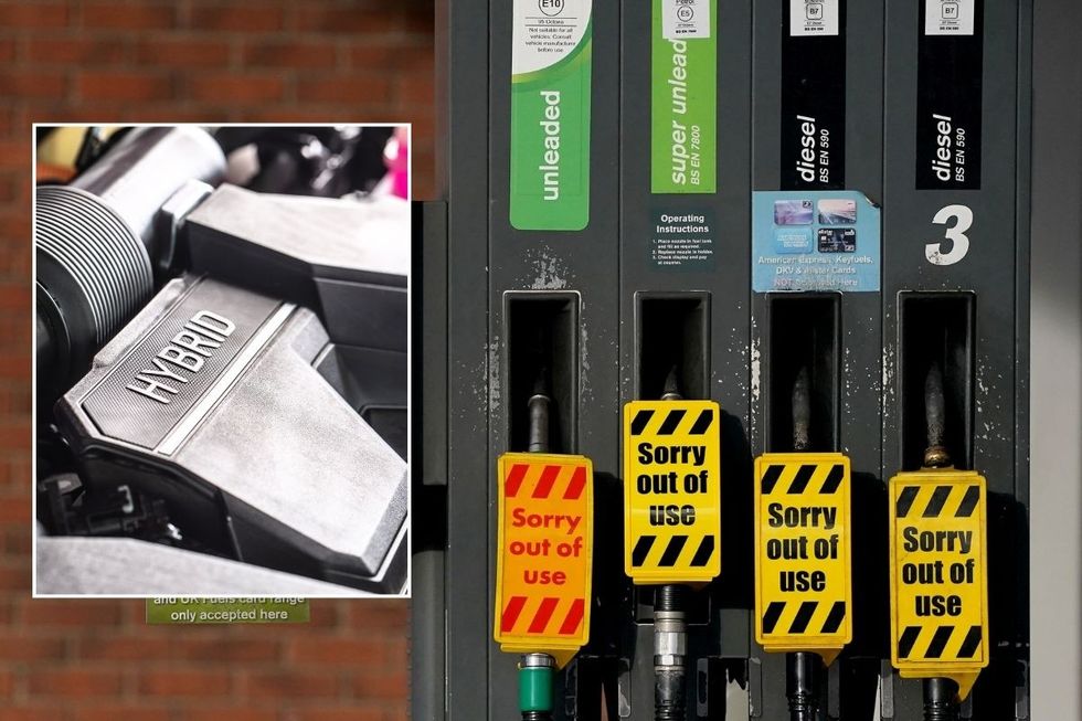 Hybrid car and empty petrol and diesel pumps