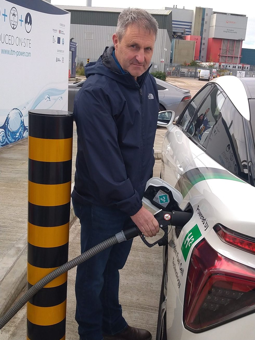 Ian Nellins refuelling the hydrogen-powered vehicle in Tyseley