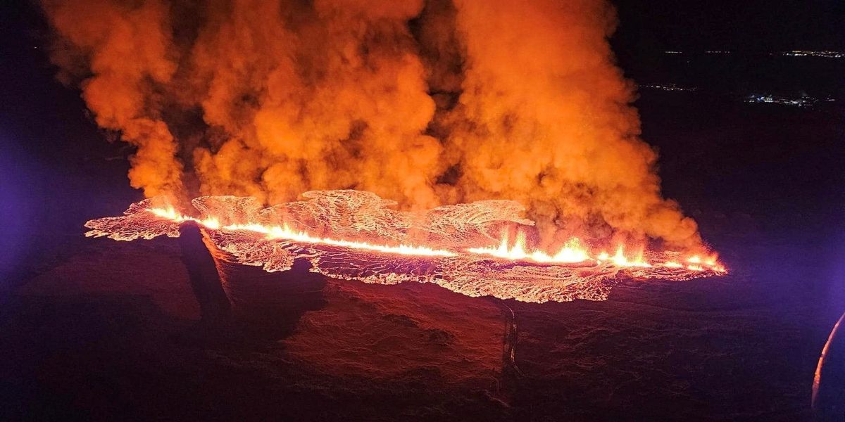 NextImg:Iceland volcano erupts with fast-flowing lava making way towards local town