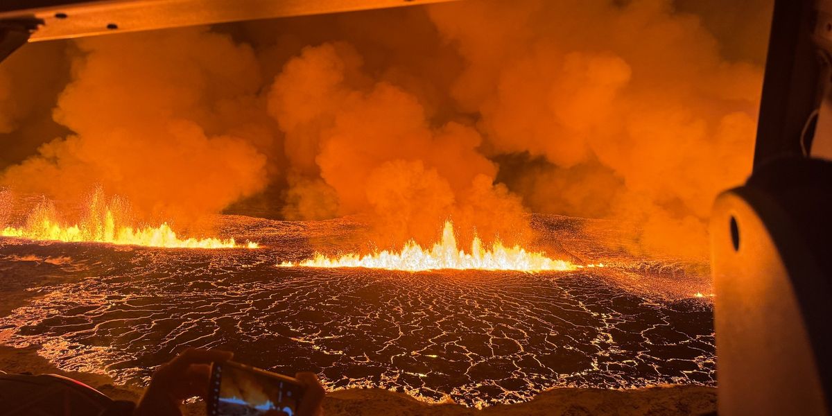 NextImg:Iceland volcano throws out 100m lava waves in stunning footage of eruption