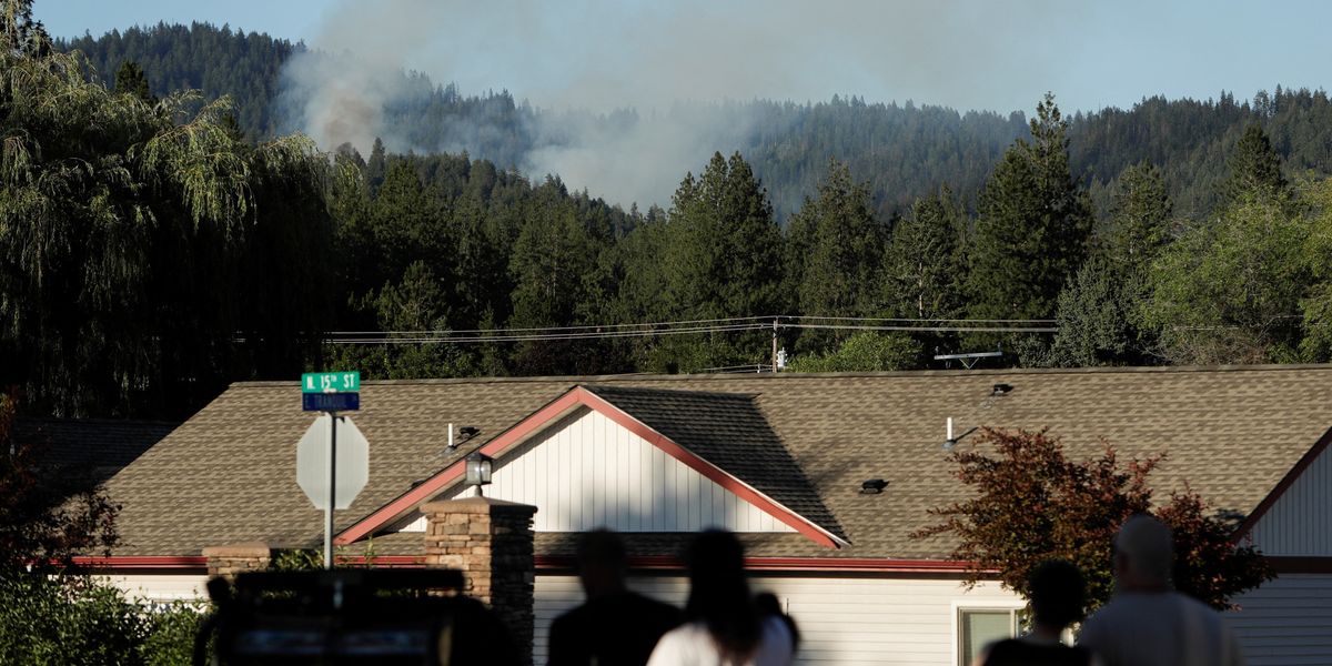 NextImg:Idaho shooting: Two dead as sniper opens fire on police and firefighters after lighting fire and waiting in ambush