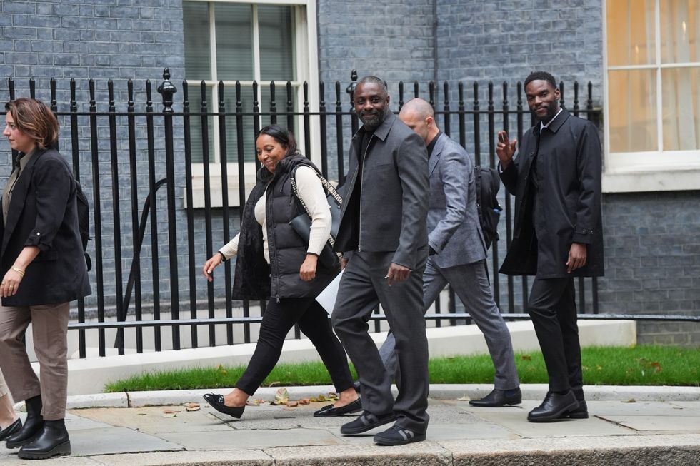 Idris Elba (centre) arrives to attend a knife crime summit hosted by Prime Minister Sir Keir Starmer