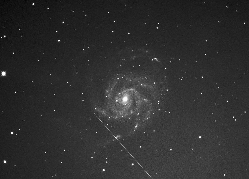 Image of the Starlink satellite in orbit, in front of M101 galaxy\u200b