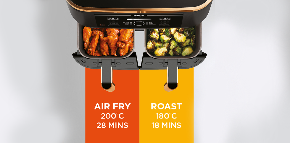 image showing the ninja foodi max from a top down view with chicken and Brussels sprouts