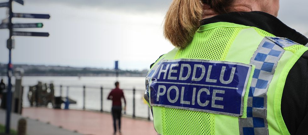 Two people die after car crashes into river in Swansea
