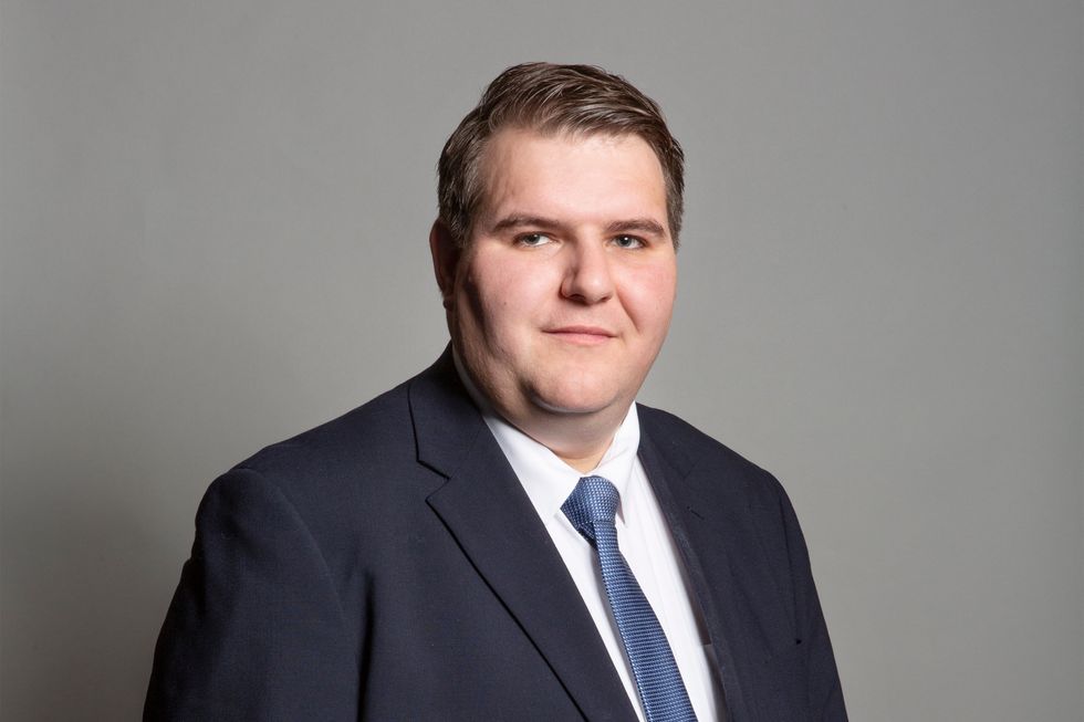 Jamie Wallis MP charged with failing to stop after car crash