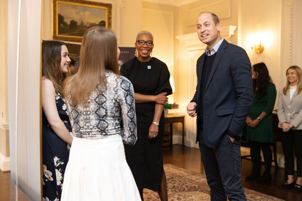 Prince William and Harry talk to winners of award honouring Princess Diana