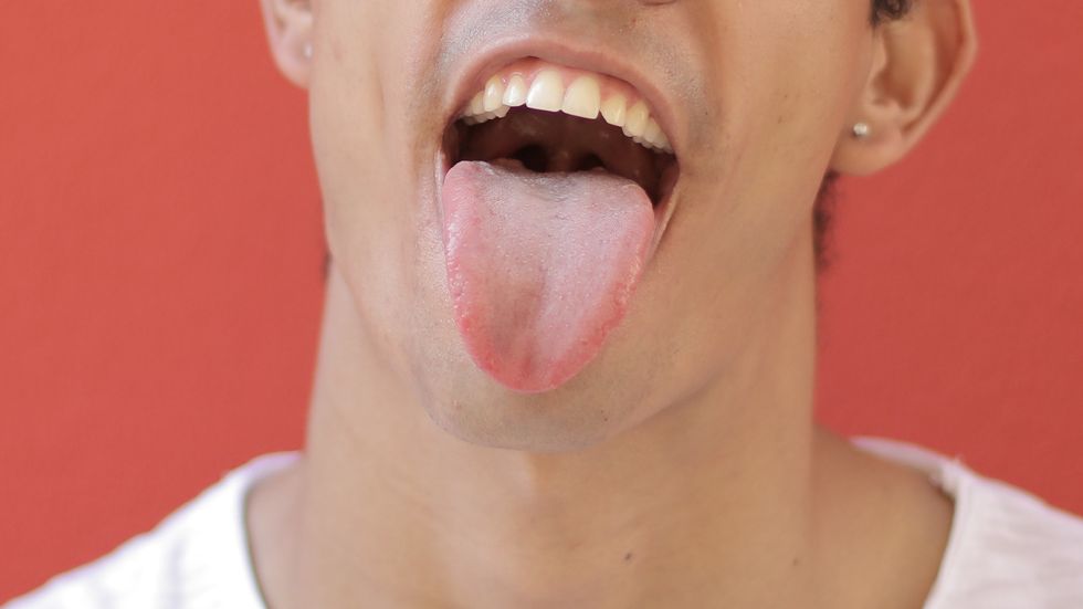 Woman bites off rapist's TONGUE and hands it in to police as evidence