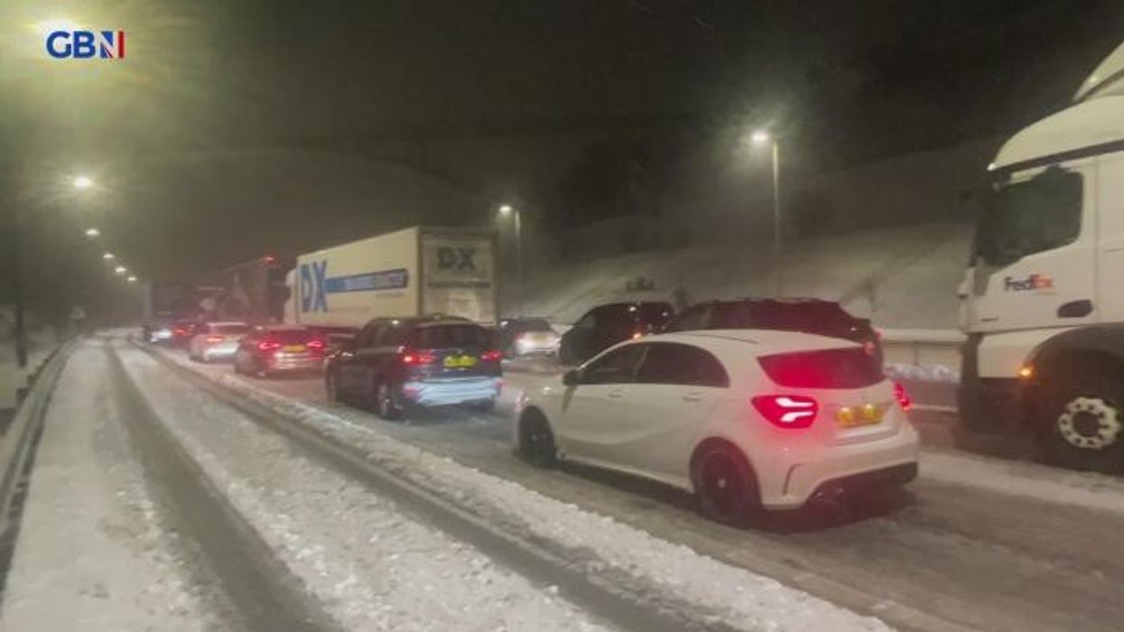Heavy snow chaos: Britain plunged into mayhem by weather storm with M62 at standstill and thousands without power