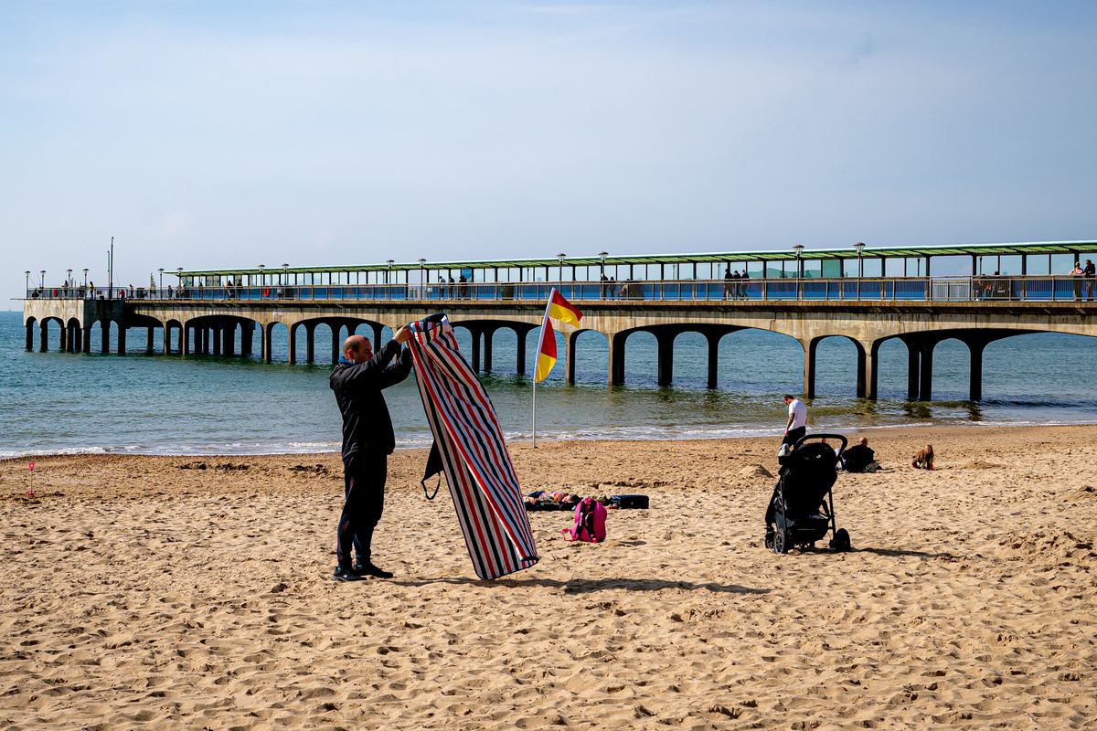 Killjoy environment adviser says Britain should not celebrate UK's hot weather