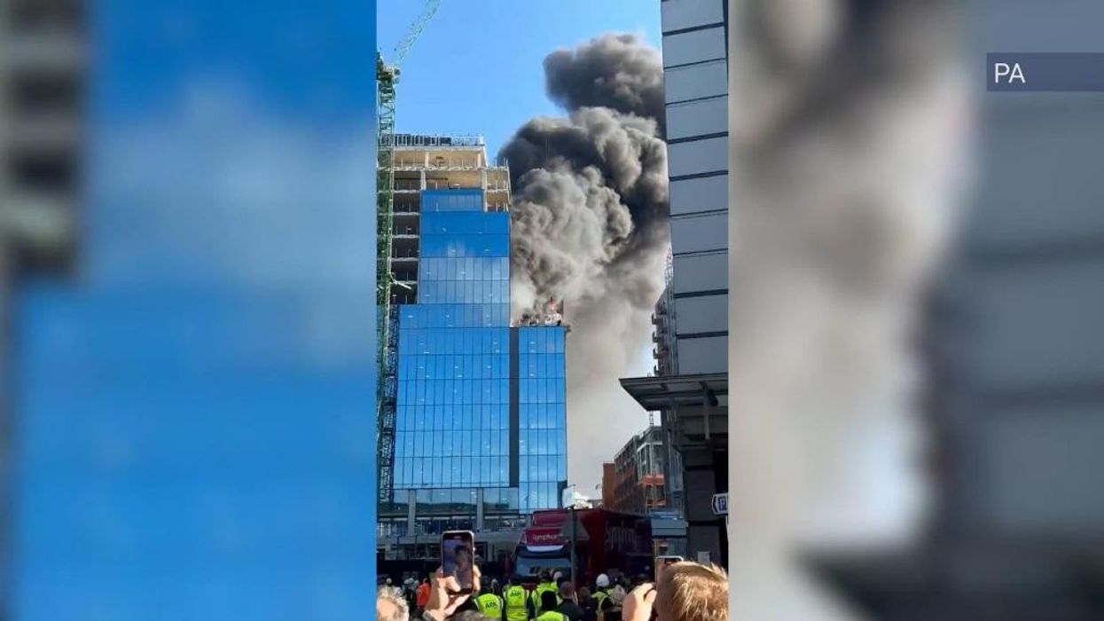 WATCH: Smoke billows as building goes up in flames in Reading