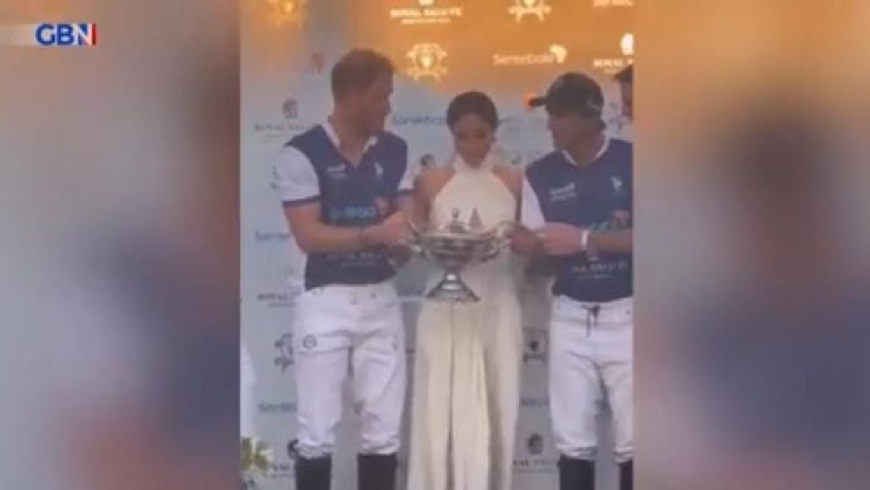 WATCH: Harry and Meghan share passionate kiss at charity polo match
