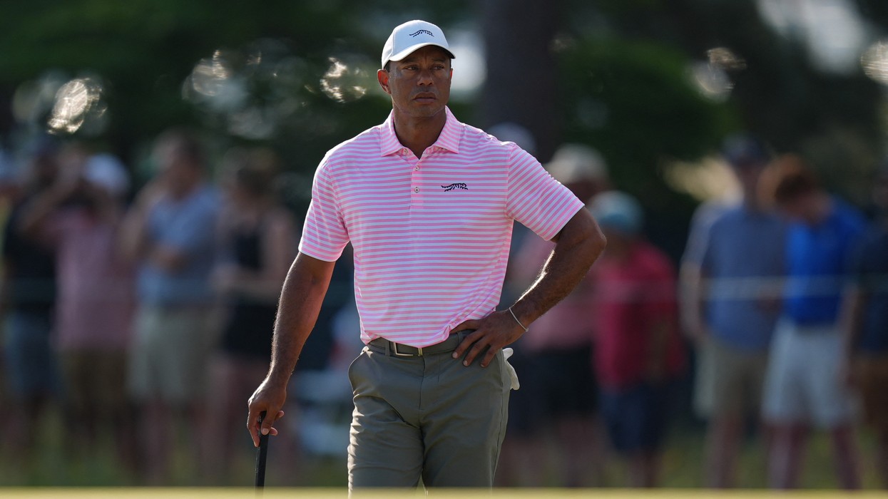 Tiger Woods causes frenzy in US Open first round as Phil Mickelson's woes continue