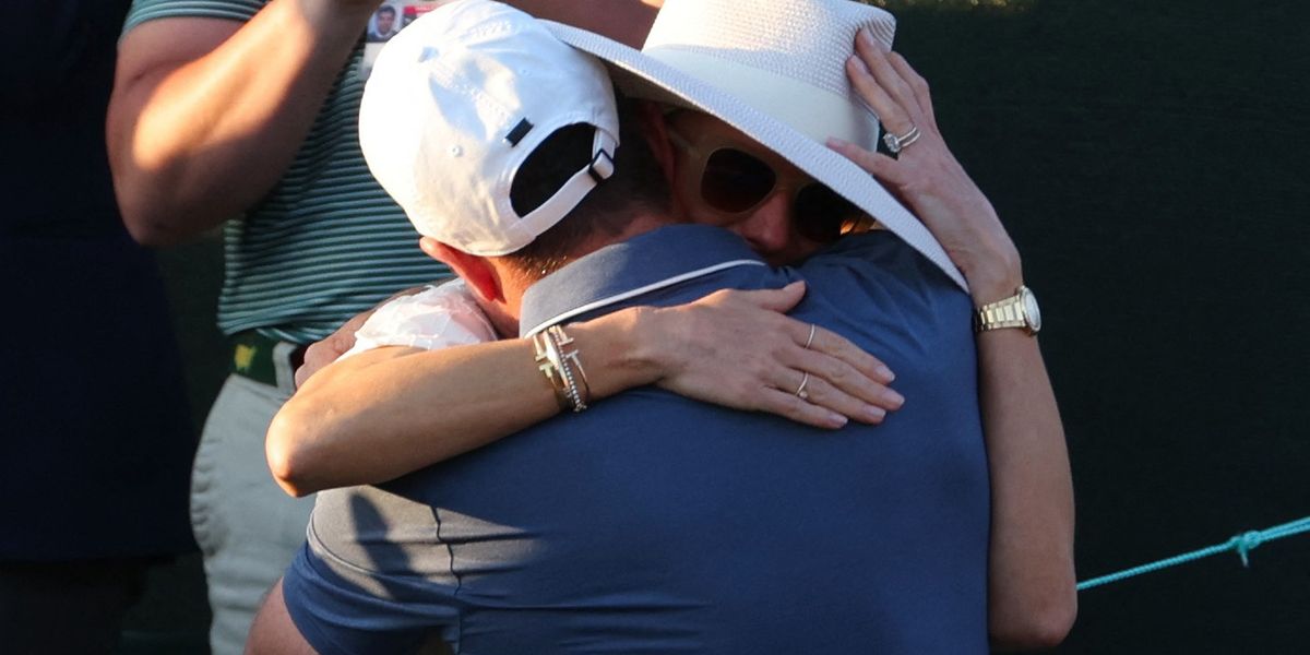 NextImg:Rory McIlroy embraces wife Erica Stoll after breaking down in tears following Masters triumph