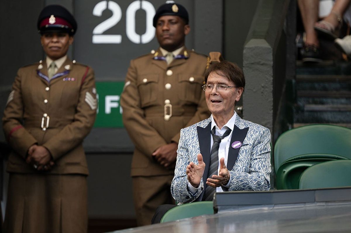 Sir Cliff Richard, 84, delights fans as he steps out all smiles during rare public outing at Wimbledon