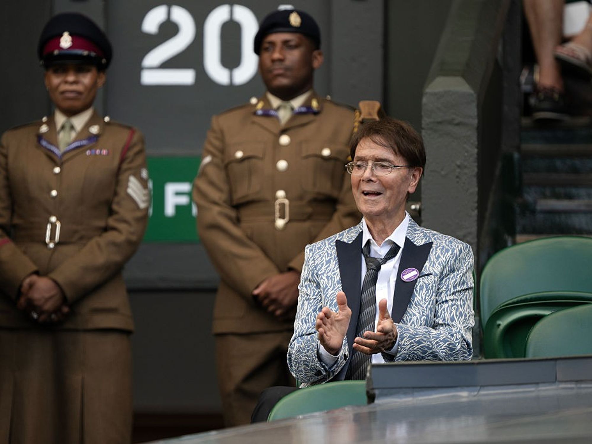 Sir Cliff Richard, 84, delights fans as he steps out all smiles during rare public outing at Wimbledon