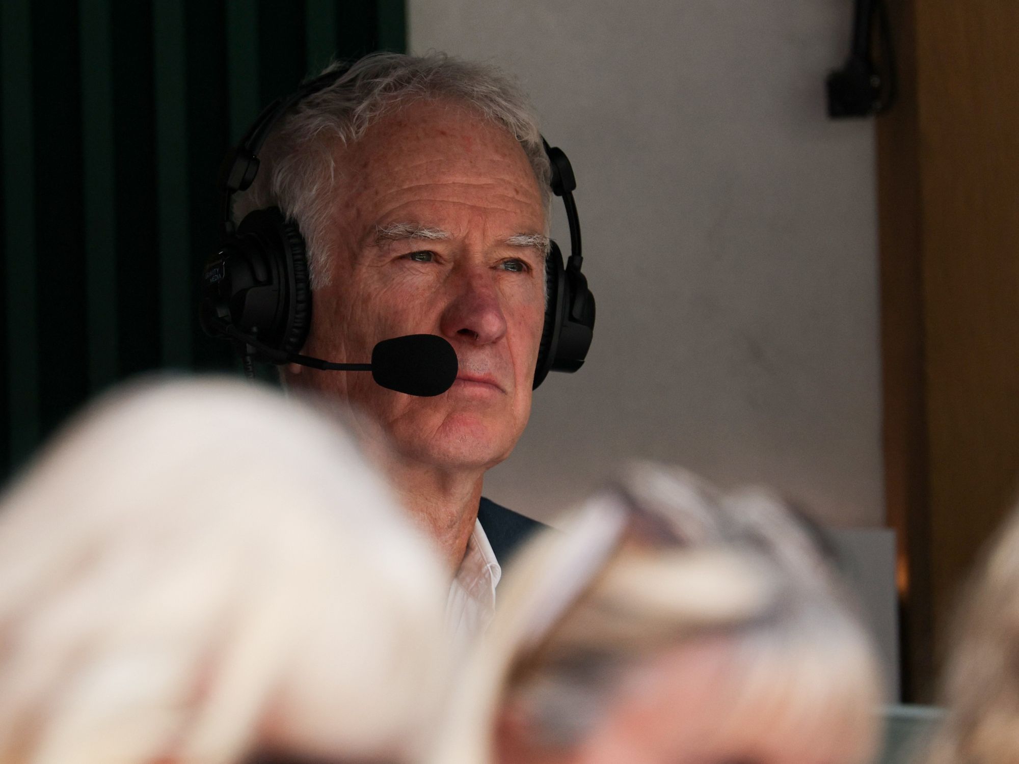 John McEnroe calls for Wimbledon chiefs to enforce ban after seeing Iga Swiatek and Amanda Anisim...