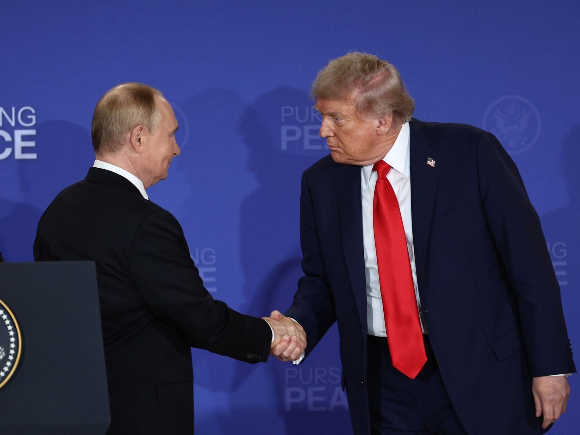 Donald Trump talks compared to Adolf Hitler appeasement as US accused of 'playing into Vladimir P...