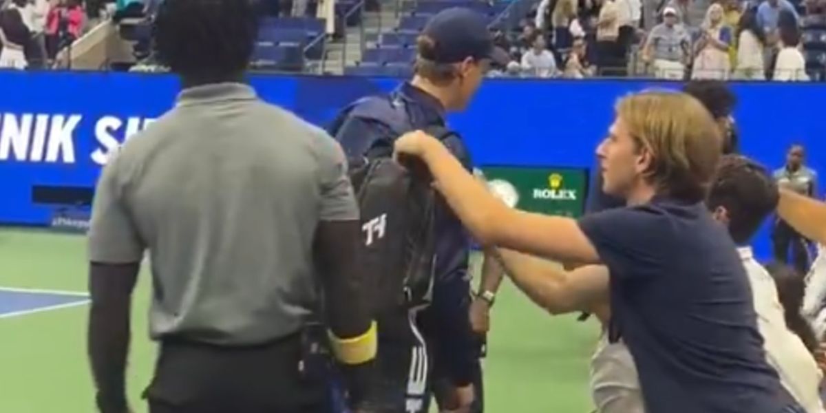 NextImg:US Open security forced to intervene as fan appears to try and steal something from Jannik Sinner