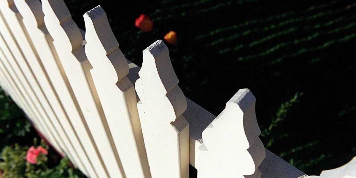 Neighbour row explodes into £40k legal battle over SIX INCH gap between gardens Neighbour row explodes into £40k legal battle over SIX INCH gap between gardens