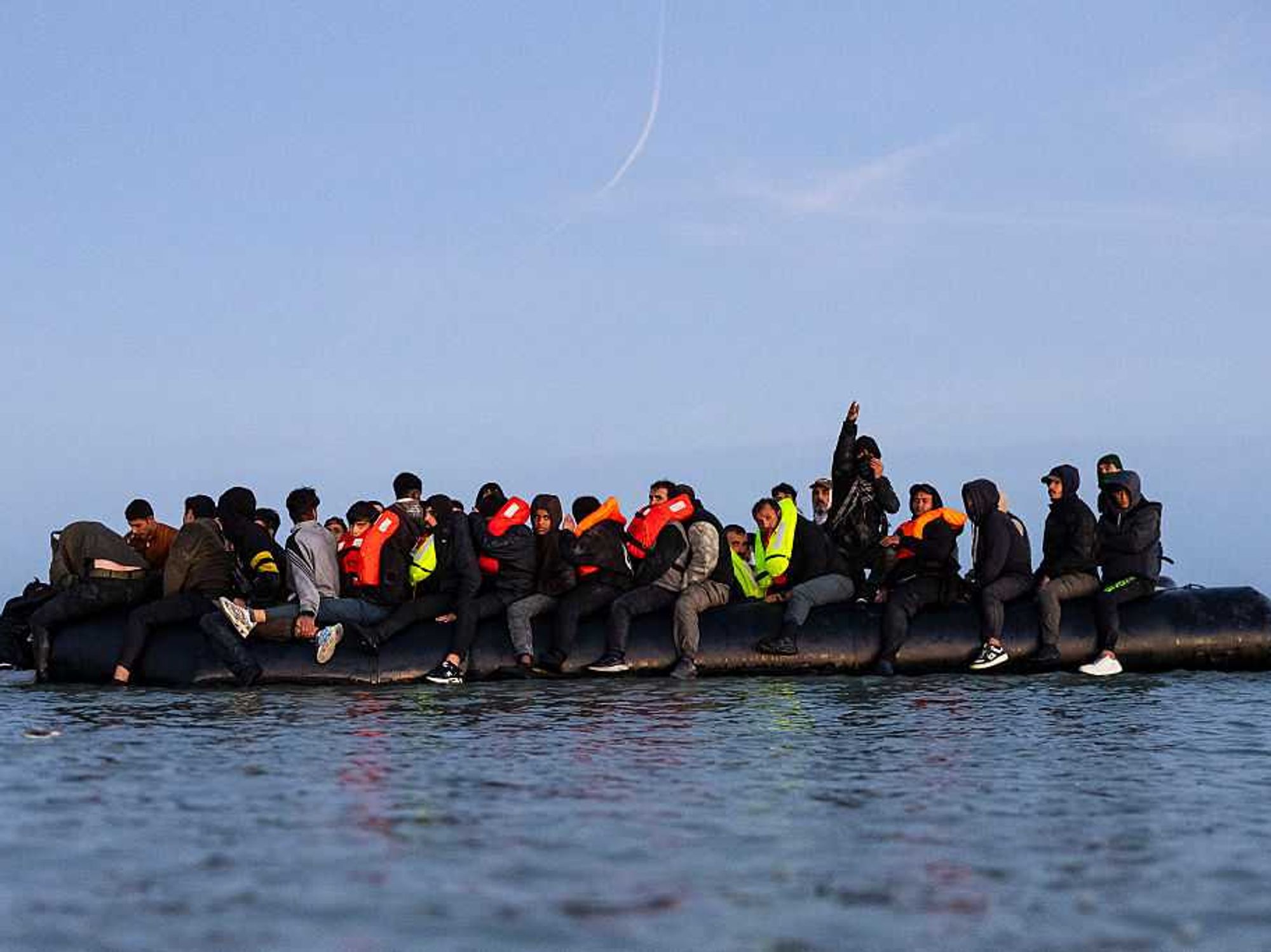 125 migrants cross Channel in 'mega dinghy' marking record number load on single boat