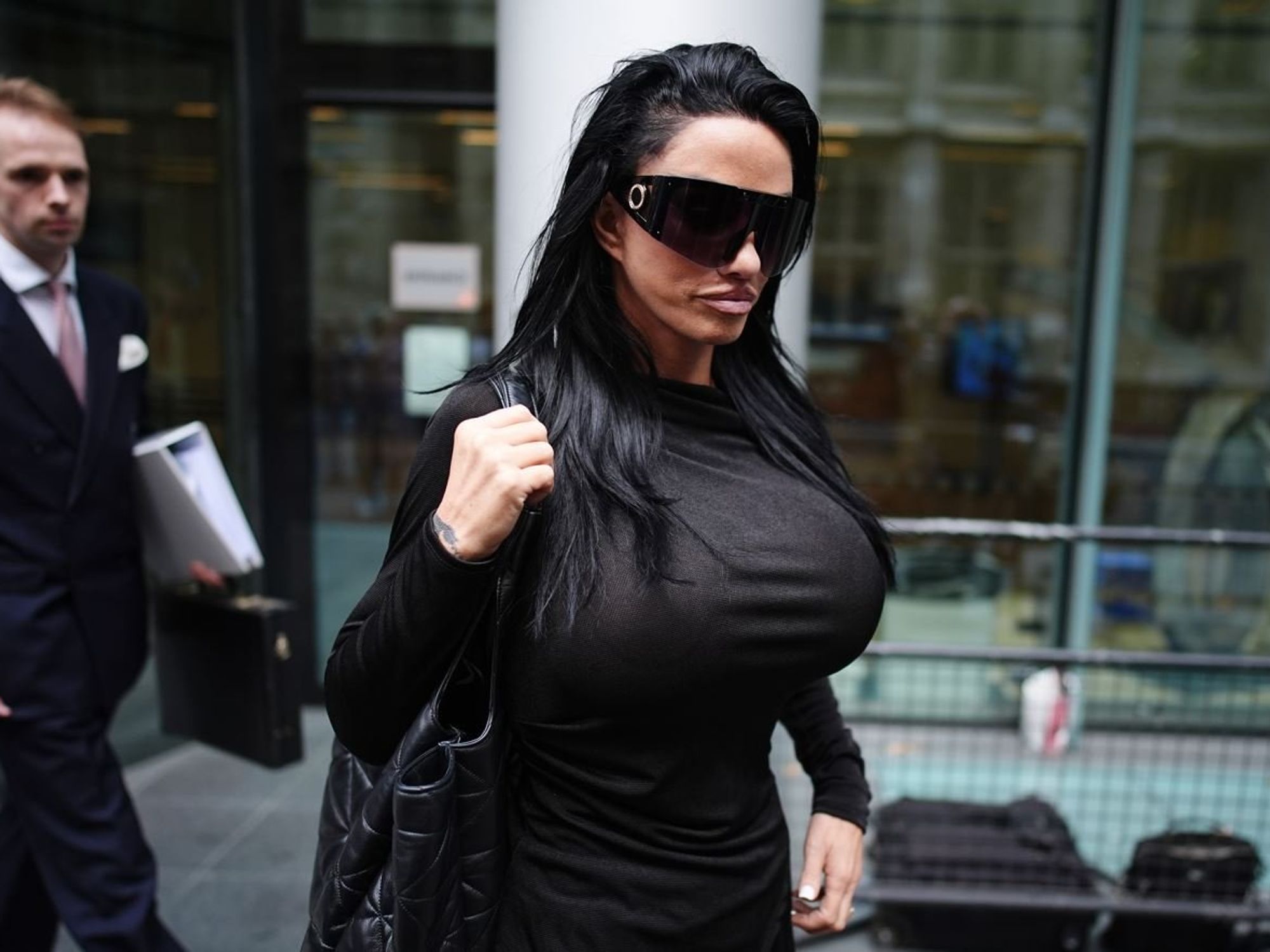 Katie Price names British celebrity she claims raped her during live show as attendees left in shock