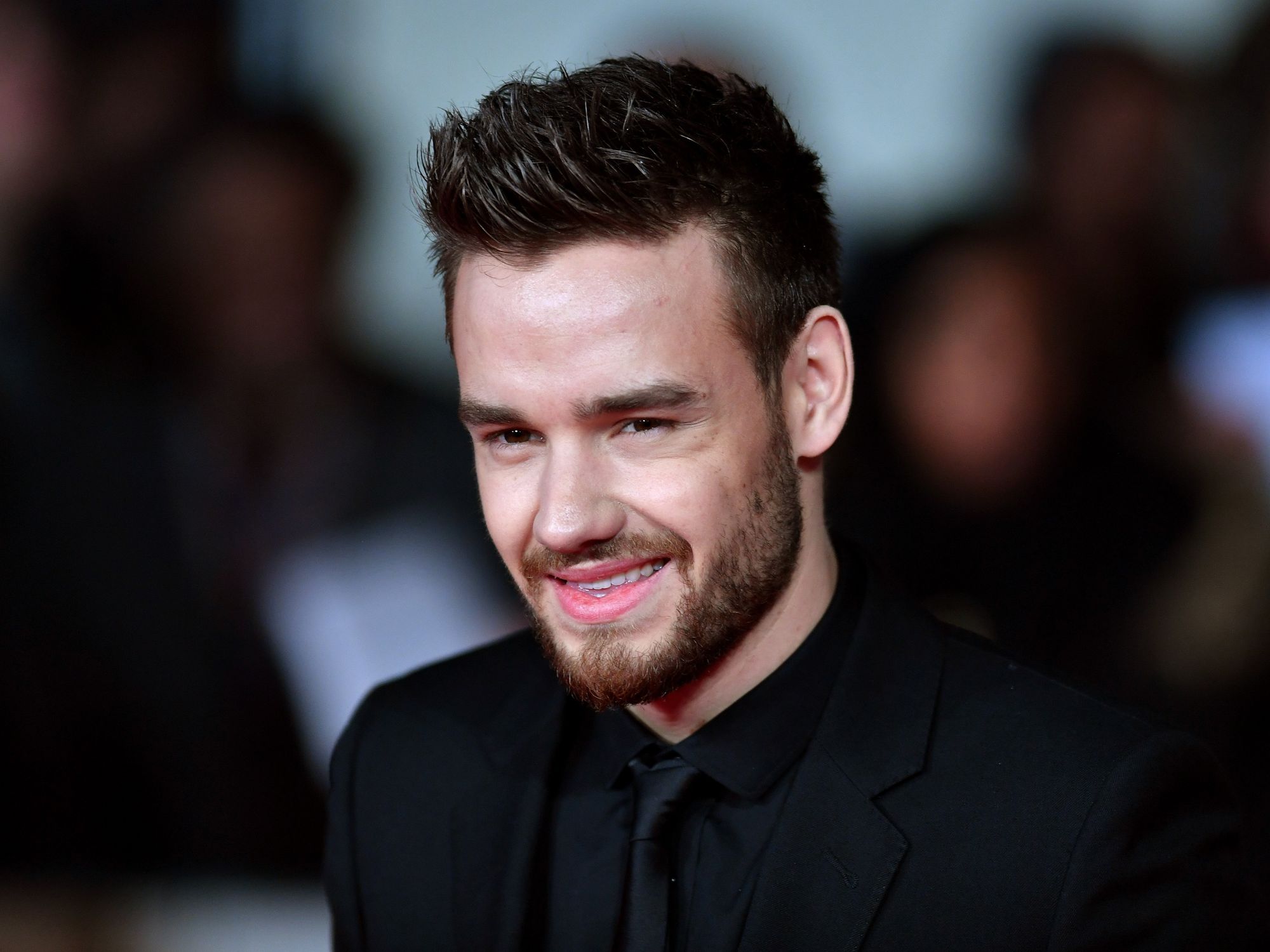 Liam Payne's sisters share heartbreaking tributes to mark first anniversary of One Direction star...