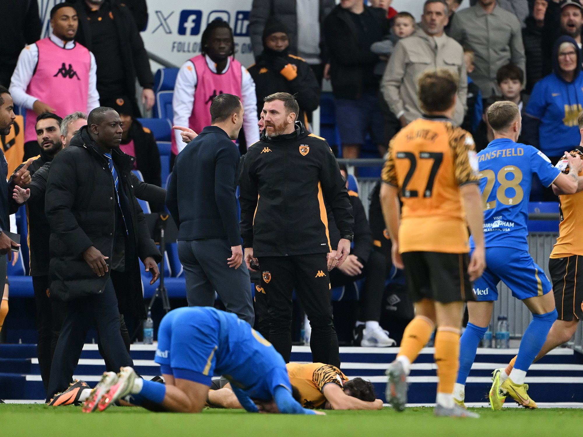 Championship match stopped with security forced to intervene following huge brawl involving playe...