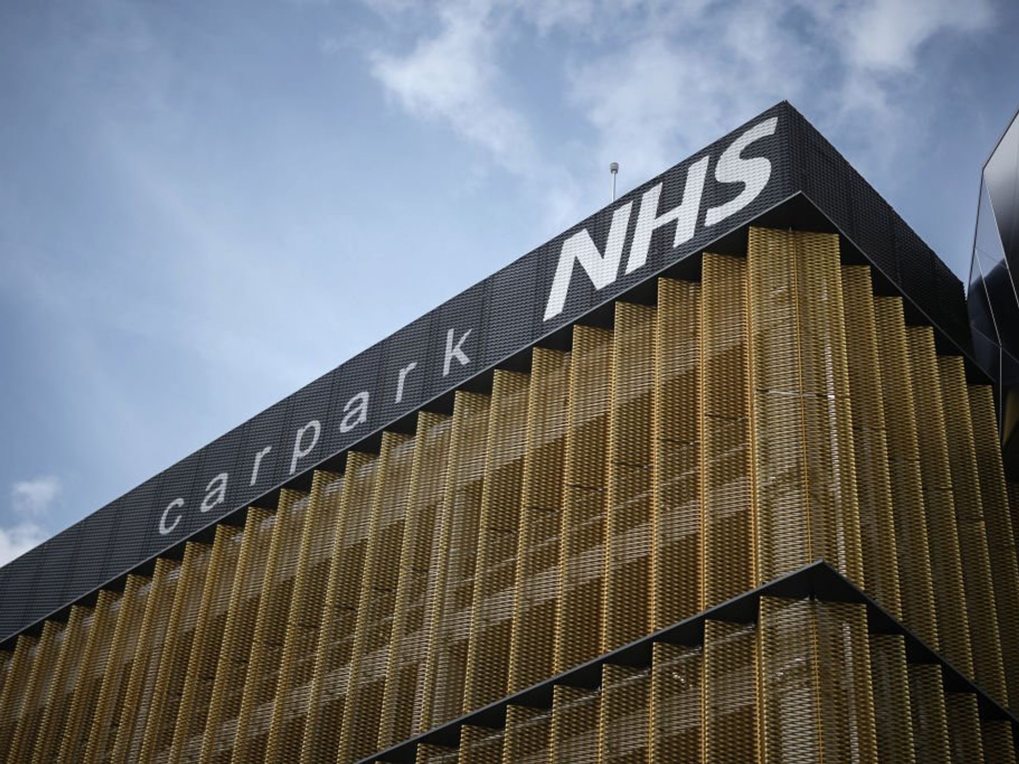 Thousands of NHS staff slapped with parking fines for 'being at work'