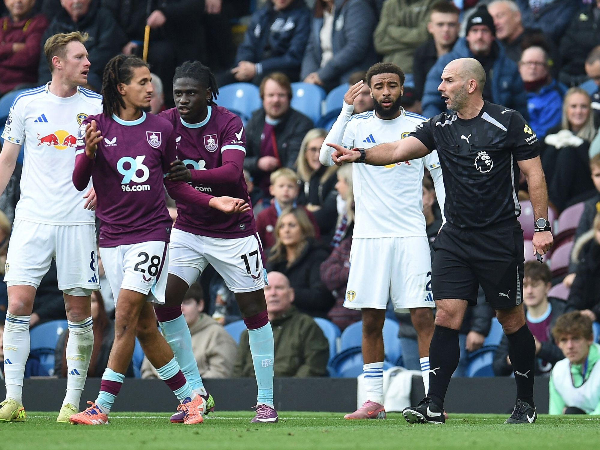 Police and the FA investigate Premier League star over spitting at Leeds fans allegations