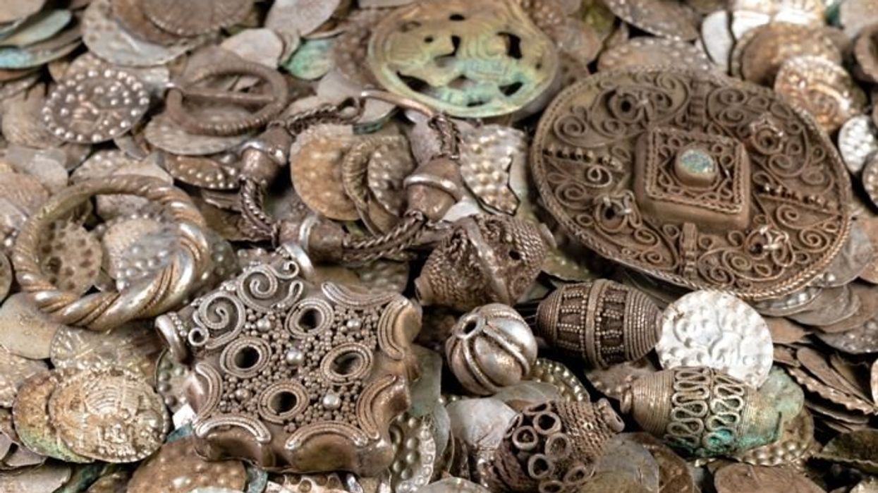 Archaeology breakthrough as fisherman digging for worms stumbles across staggering medieval hoard