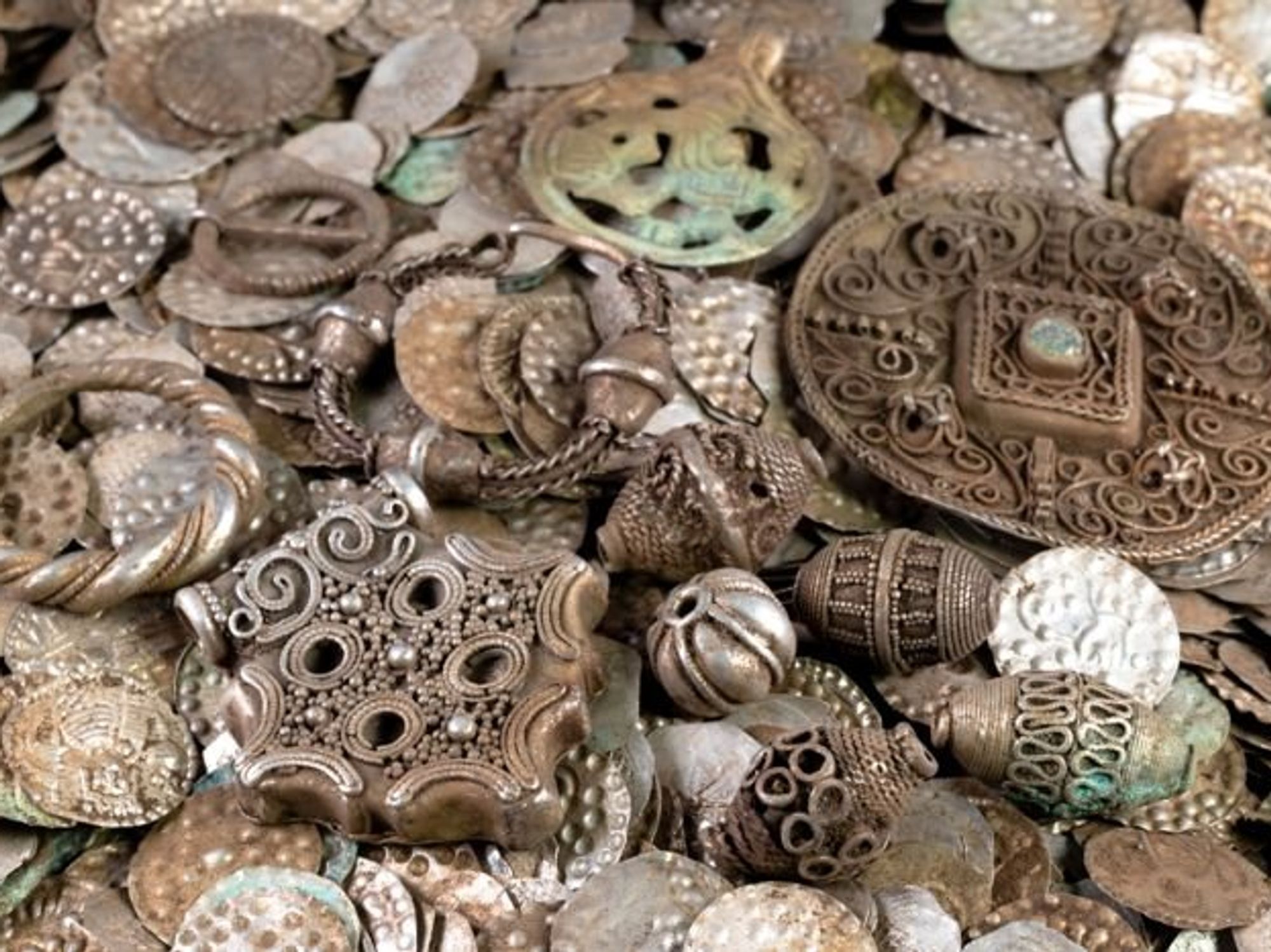 Archaeology breakthrough as fisherman digging for worms stumbles across staggering medieval hoard