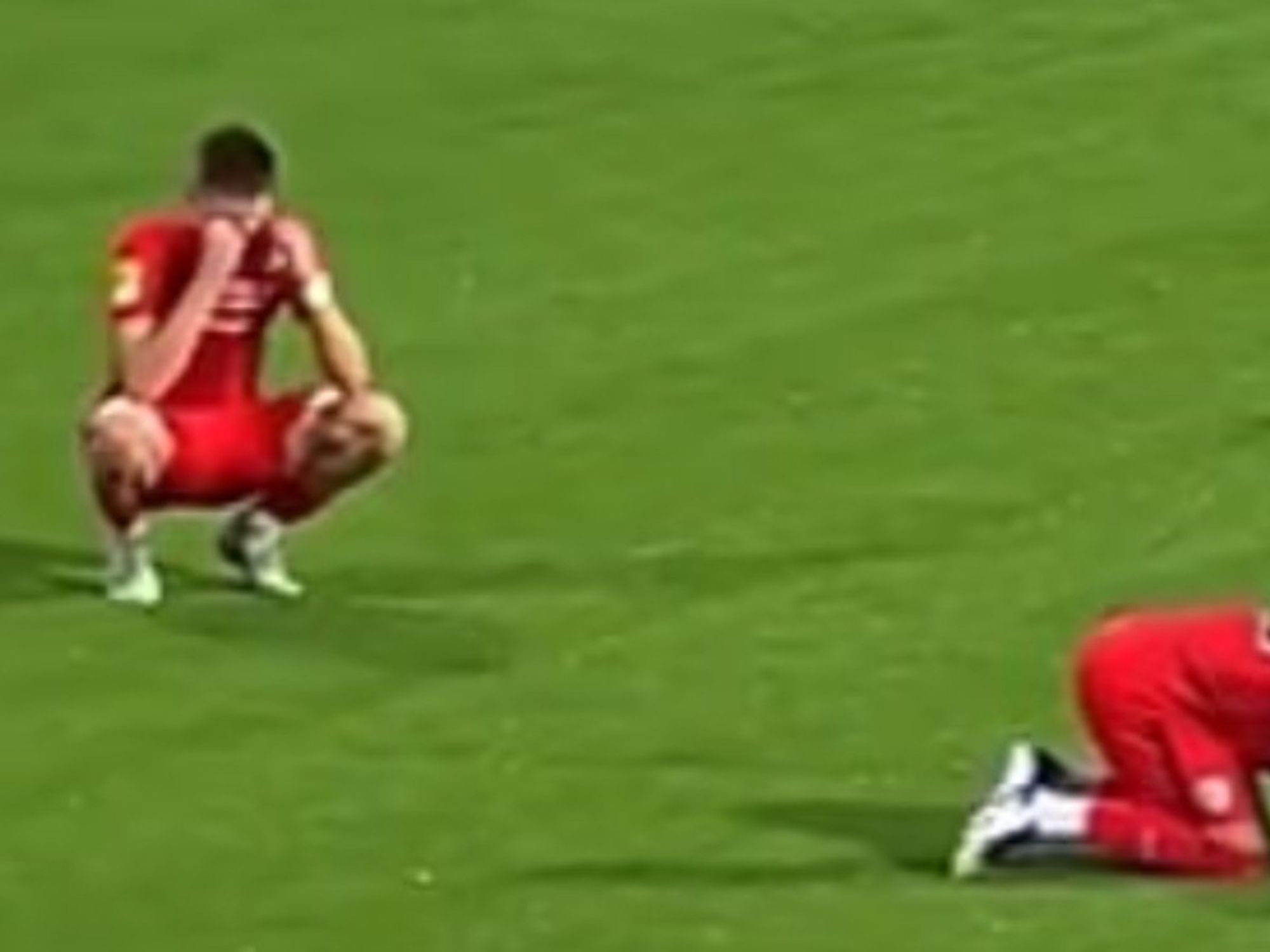 Footballers collapse in devastation after learning manager has died mid-match following heart attack