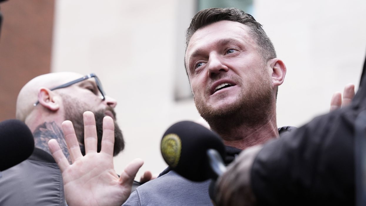 Tommy Robinson cleared of terror charge after failing to provide police with mobile phone pin